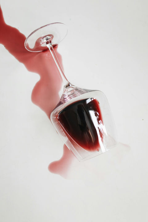 Red wine glass spilling